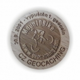 První geocoin